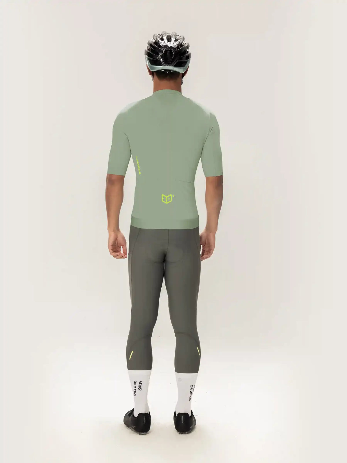 Roam men jersey short sleeves green back view featuring a sleek light green fabric with neon yellow logo