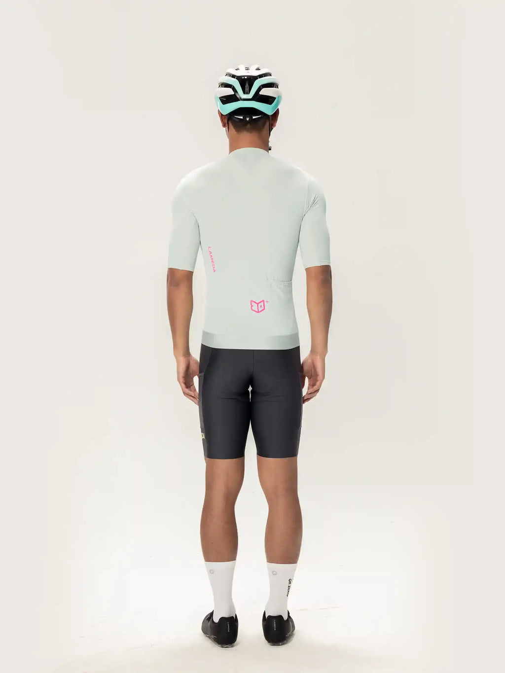 Light gray roam men short sleeves cycling jersey showing back side with a subtle pink logo for road cycling use