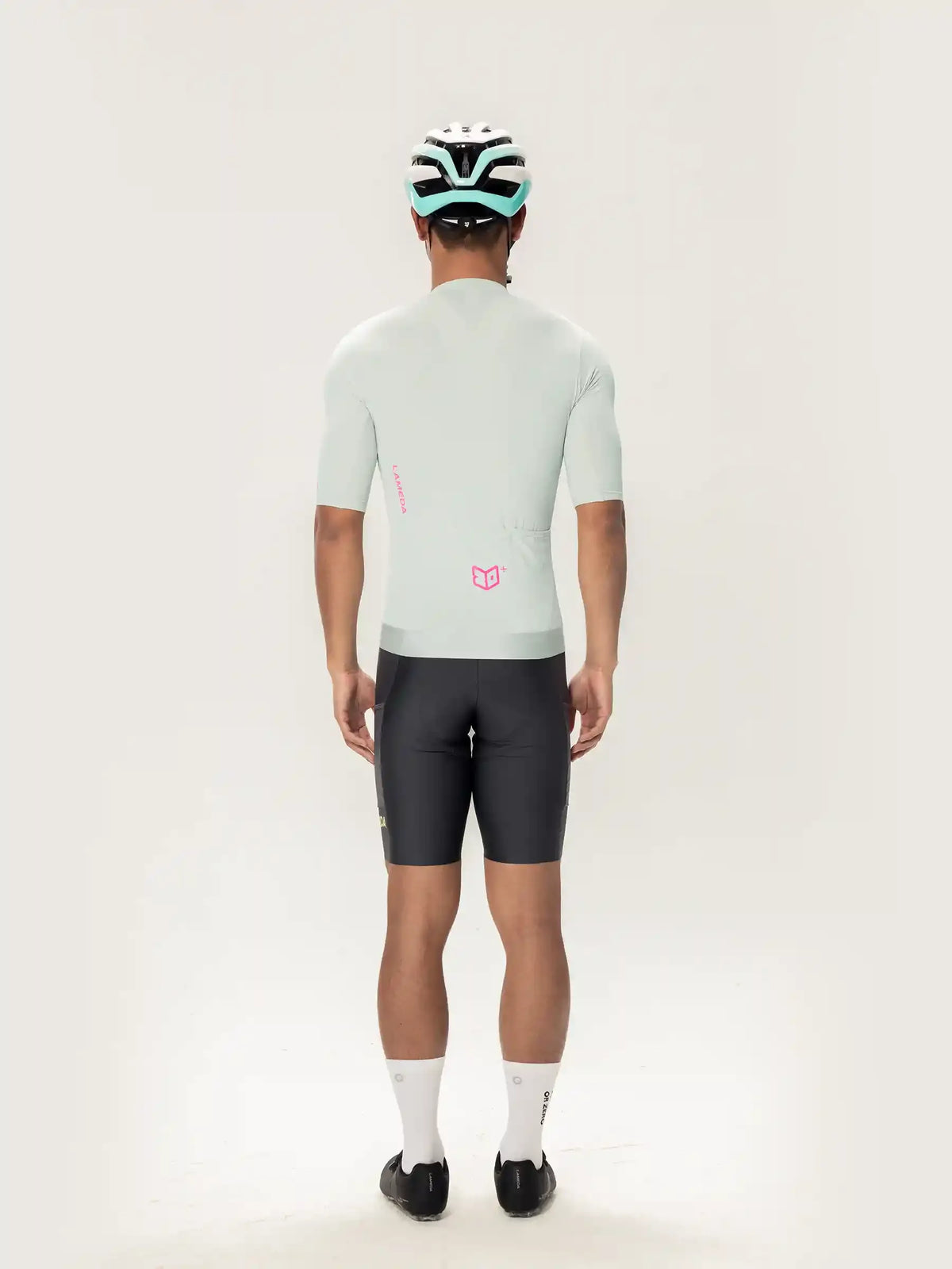 Light gray roam men short sleeves cycling jersey showing back side with a subtle pink logo for road cycling use