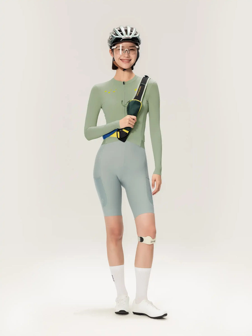 Roam women jersey long sleeves in light green with subtle texture and matching shorts for cycling use