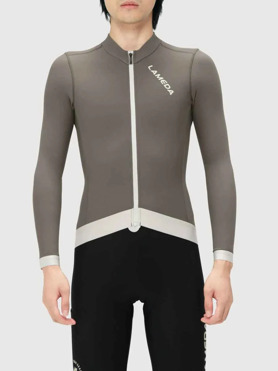 Freeze men’s fleeced thermal jersey gray long-sleeved cycling top with white zipper and trim for cold weather use