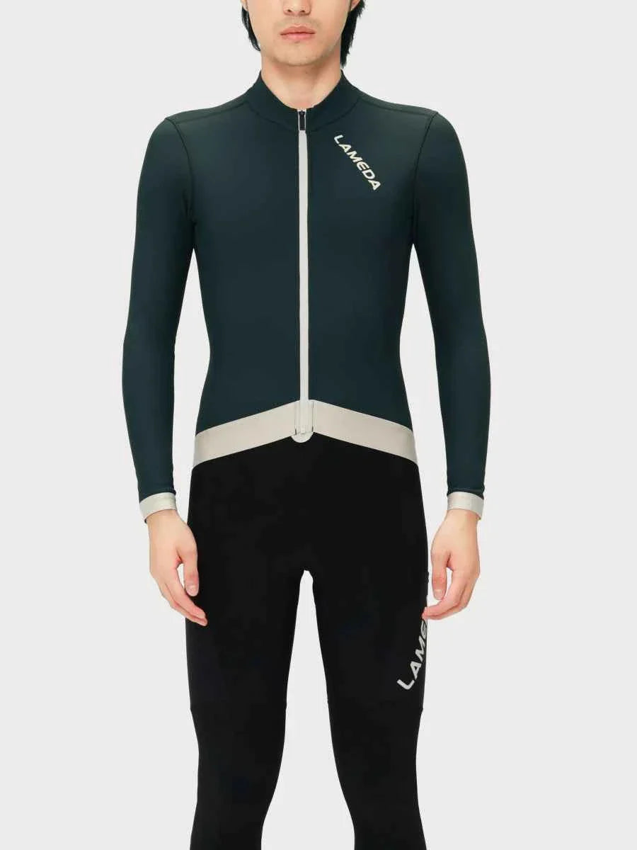Freeze men’s fleeced thermal jersey green full-body wetsuit with dark green lameda brand, white zipper, and gray trim
