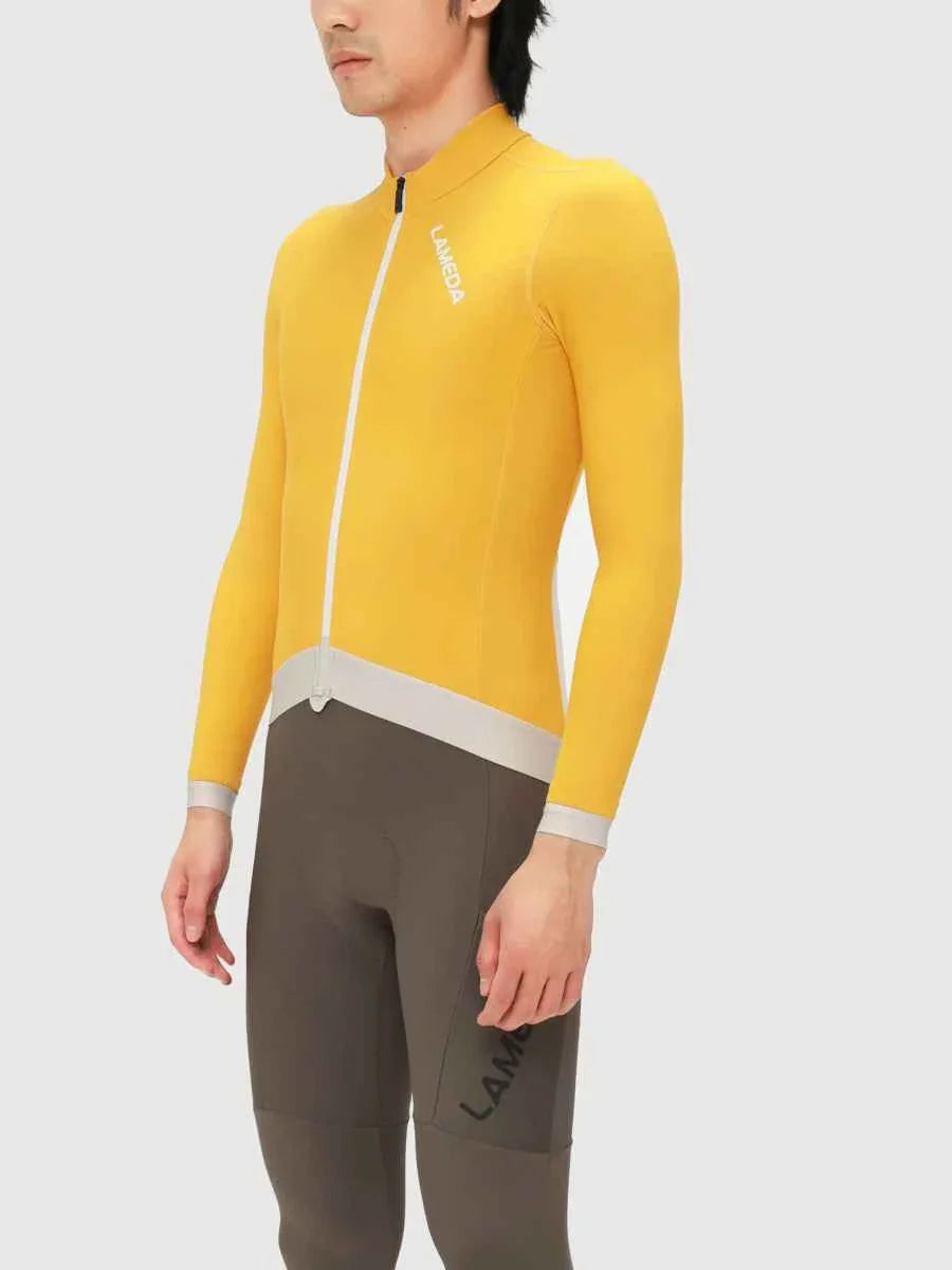 Freeze men’s fleeced thermal cycling jersey in bright yellow with white zipper and gray trim for cold weather use