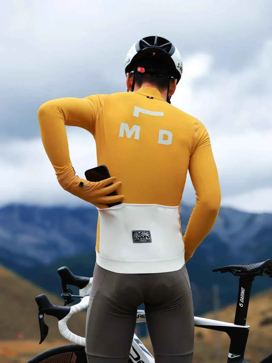 Yellow freeze men’s fleeced thermal cycling jersey with white back panel and md lettering shown from the back side