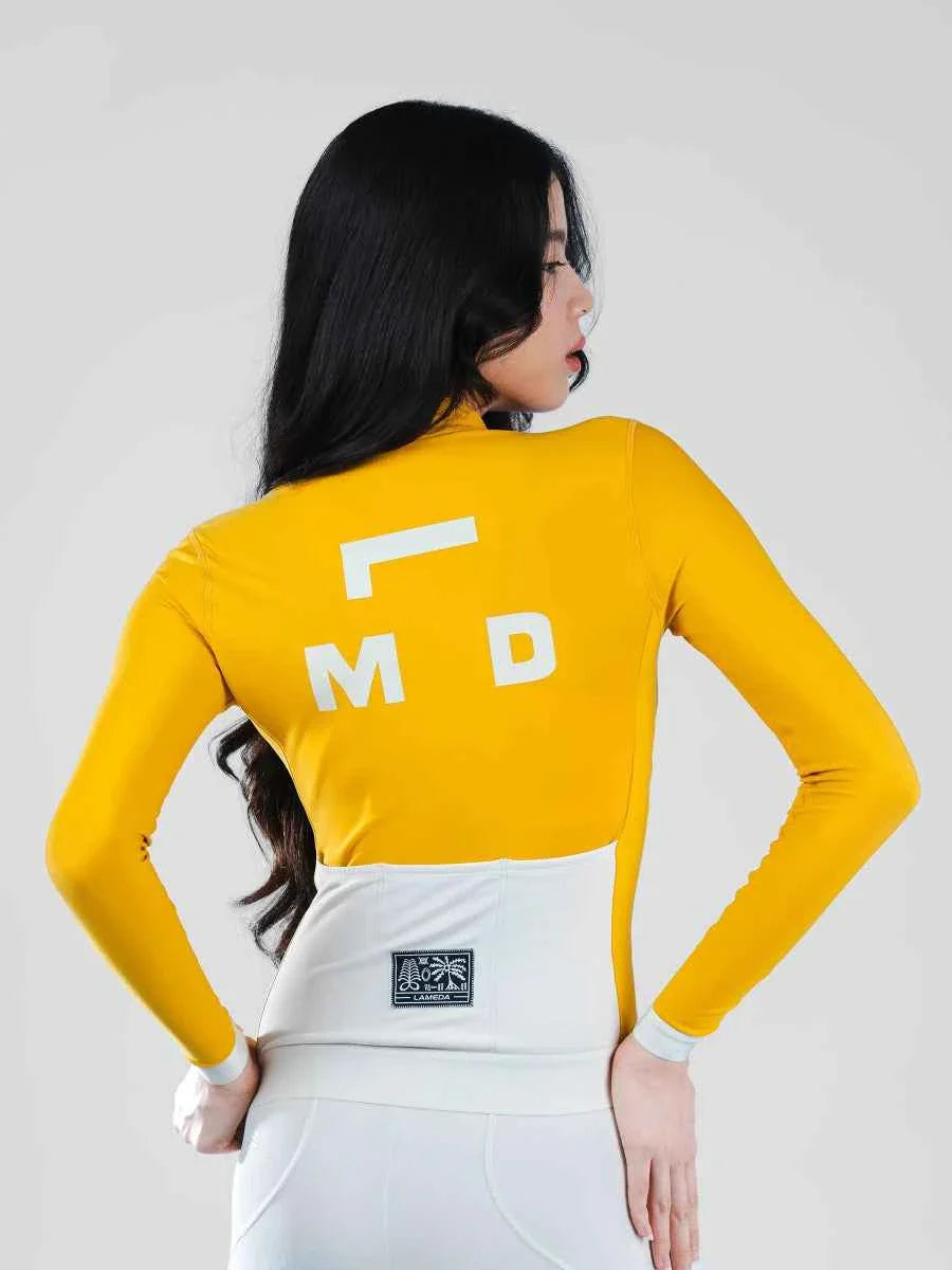 Yellow freeze womens fleeced thermal jersey with white lettering and a contrasting white waistband for warmth