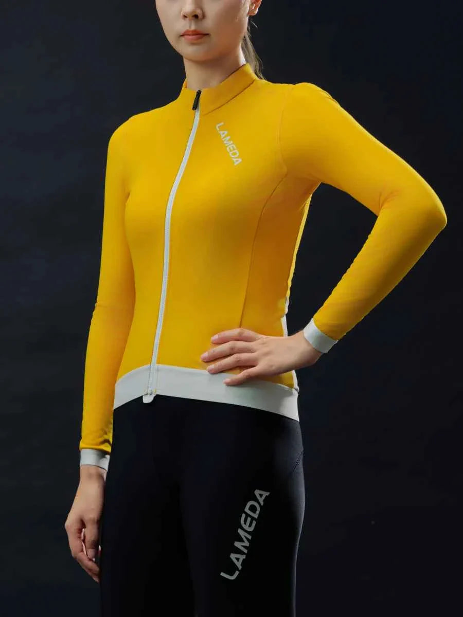 Freeze women’s fleeced thermal jersey in bright yellow with white zipper and Lameda logo on chest and leg