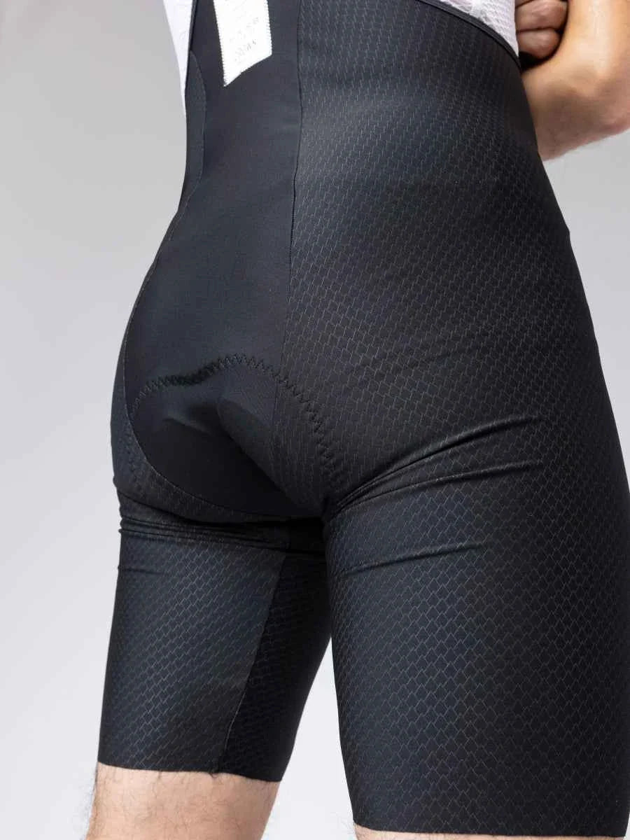 Kylin men’s bib shorts black with durable dragon scale fabric, elastic interface chamois, and upf50+ sun protection