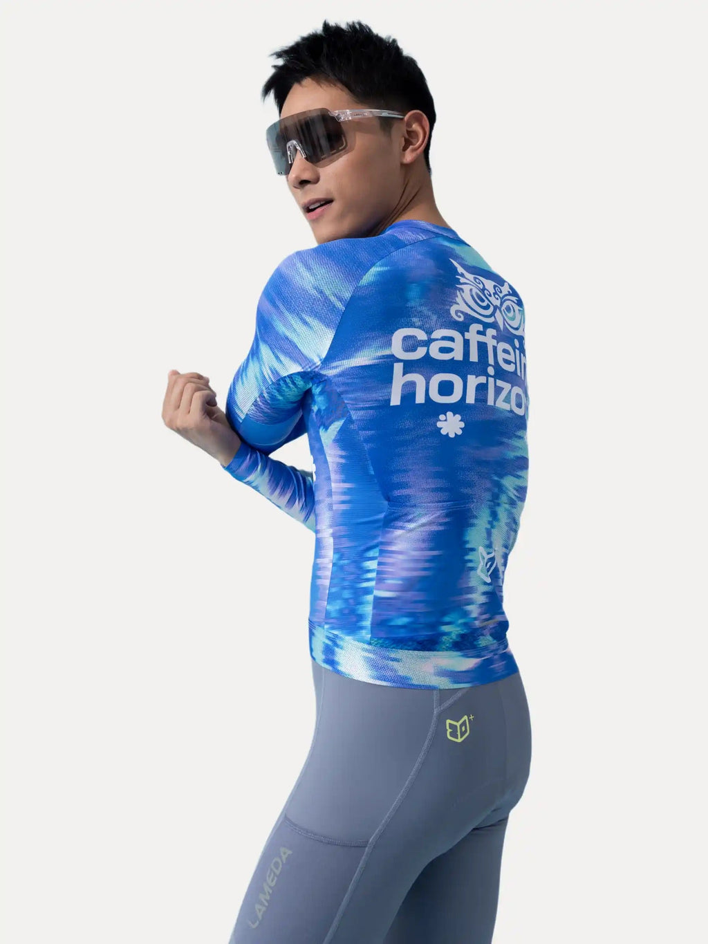 Blue and white tie-dye long-sleeve studio unisex cycling jersey with caffeine horizon branding by lameda x australian