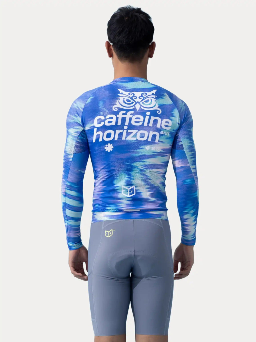 Blue and purple tie-dye long-sleeved studio unisex cycling jersey with white owl logo from lameda x australian