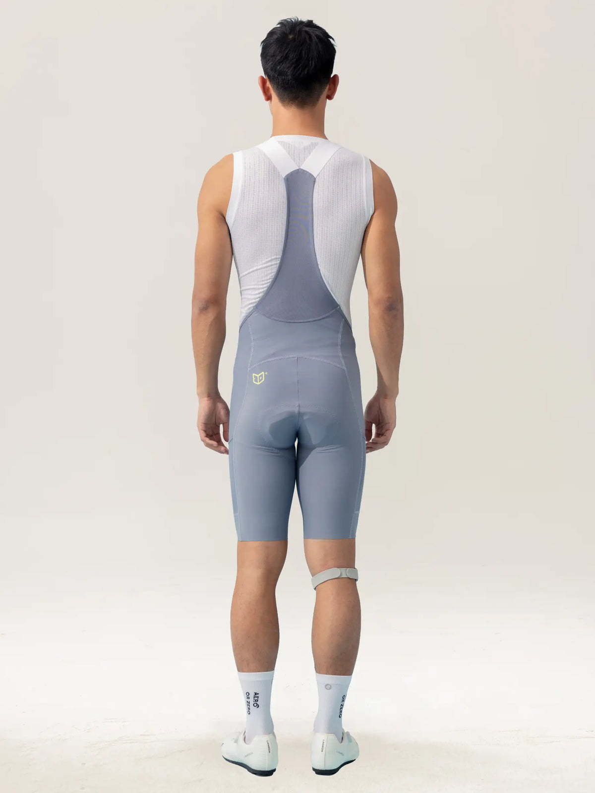 Gray and white lameda men’s cycling bib shorts with elastic interface pro and sleek, form-fitting design