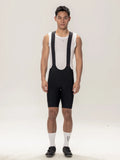 Black lameda men’s cycling bib shorts with white mesh panels and subtle red logo featuring elastic interface® technology