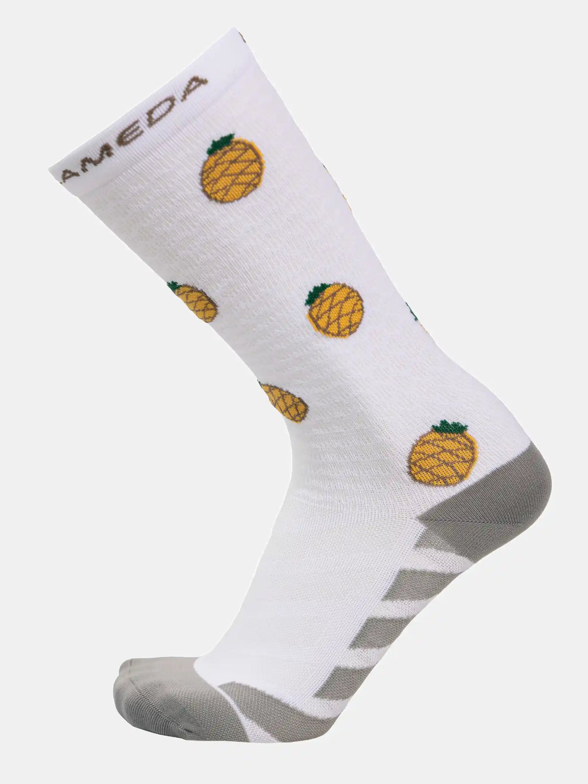 White lameda cycling socks with yellow pineapple prints gray reinforced heel toe and arch support on cuff
