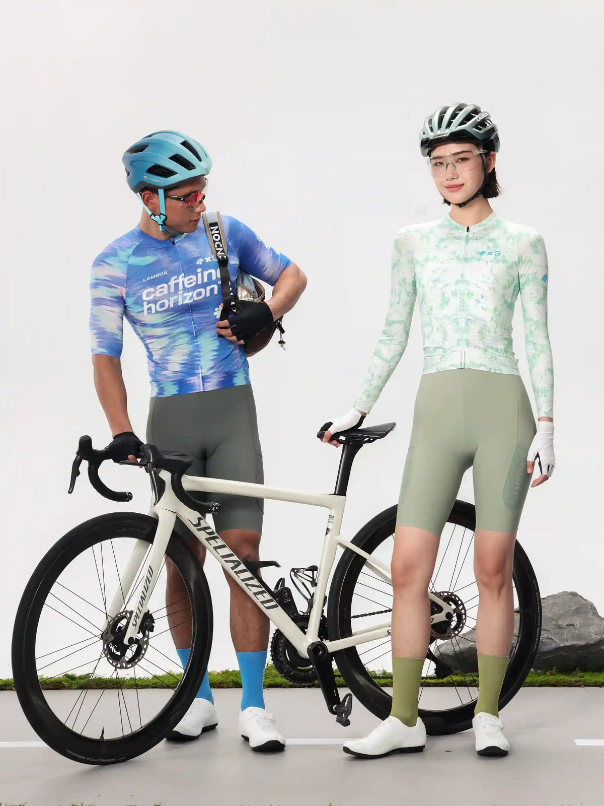 White specialized road bike with black wheels and handlebars paired with lameda x australian studio unisex cycling jersey ls fresh brew
