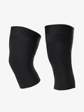 Black lameca knee sleeves with sleek form-fitting design and subtle branding ideal as lameda cycling leg warmers