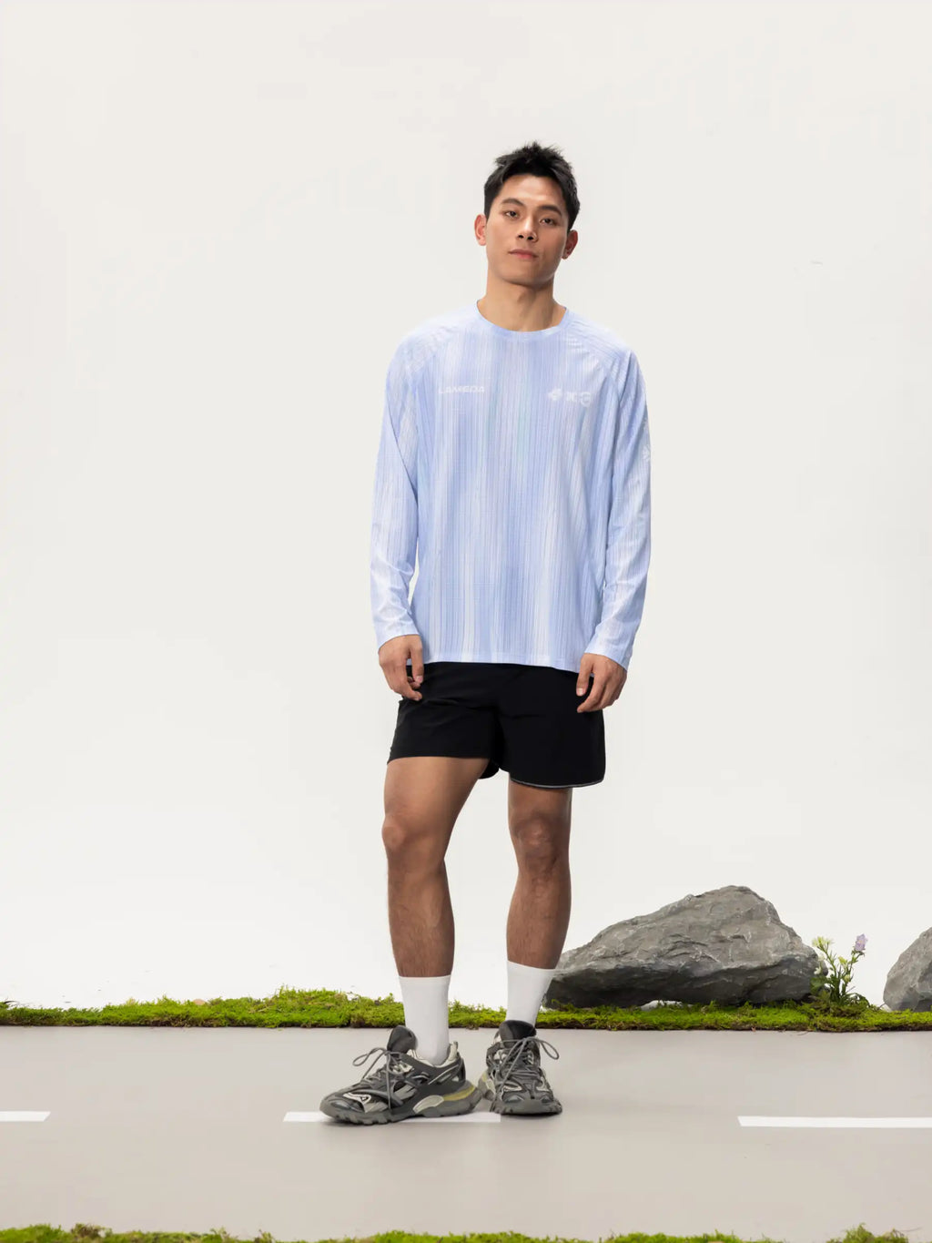 Light blue a x c unisex lightweight cycling long-sleeve t-shirt with subtle vertical stripes and highly breathable fabric