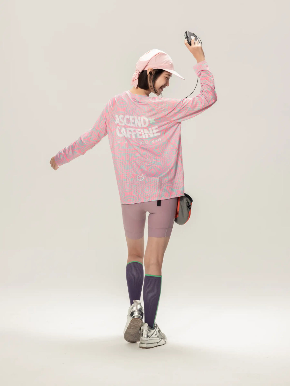 Pink ascend caffeine unisex lightweight cycling long-sleeve t-shirt with subtle pattern for outdoor adventures