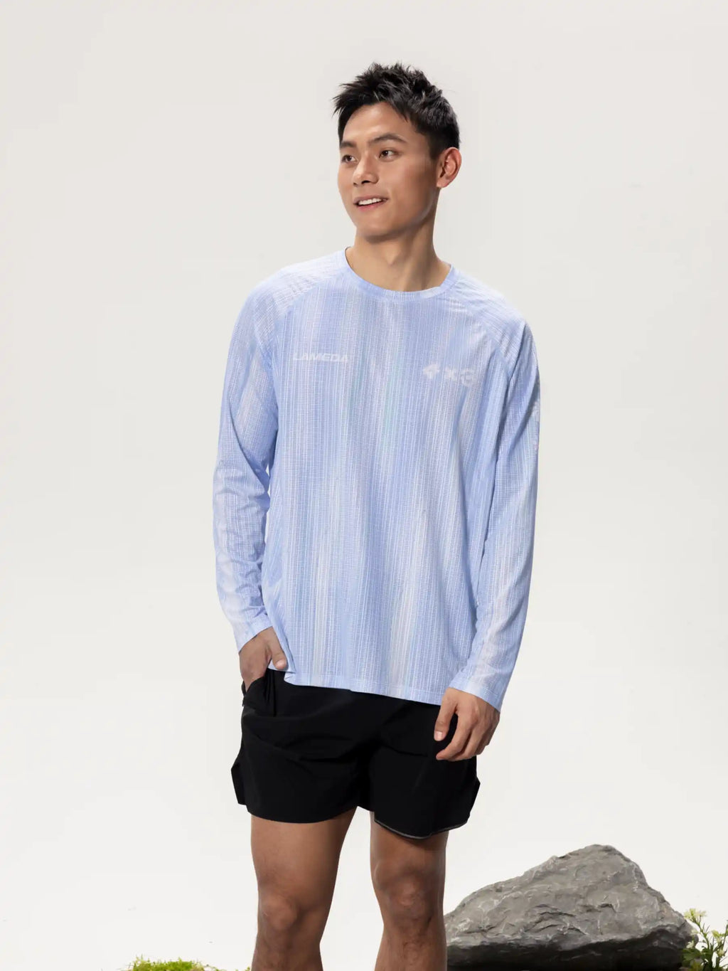 Light blue A x C unisex lightweight cycling long-sleeve t-shirt with subtle stripes and highly breathable fabric