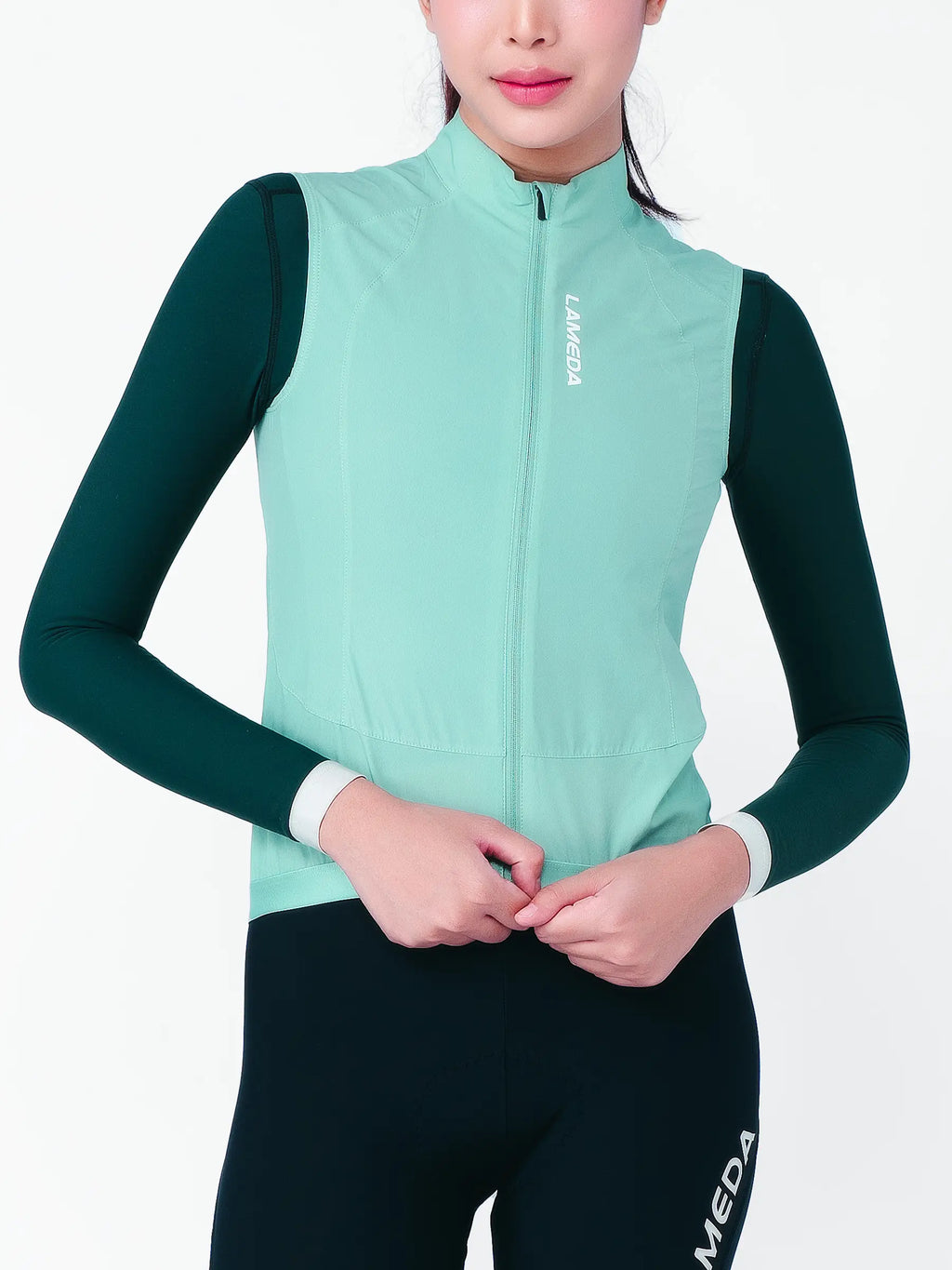 Nova women’s cycling windproof vest in mint and dark green with white zipper made from recycled polyester sorona t800 yarn