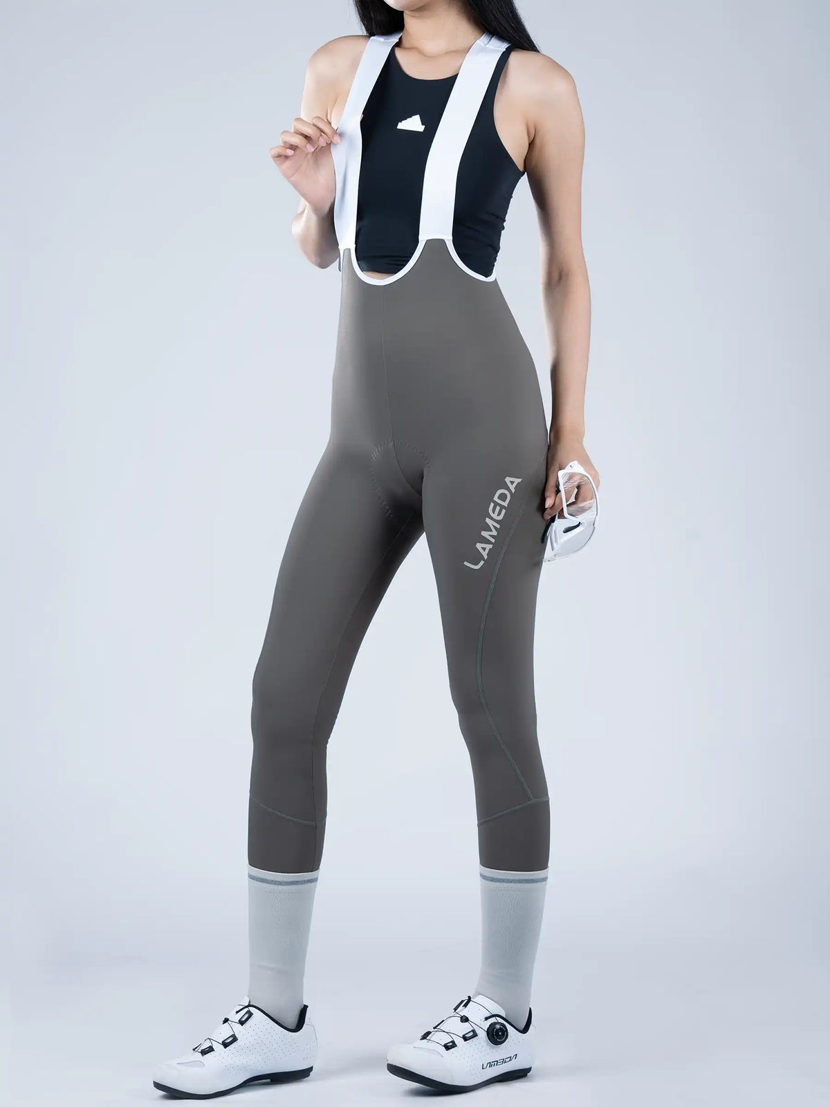 Basic thermal women’s bib tights gray with white straps black top and lameda branding featuring brushed fleece lining
