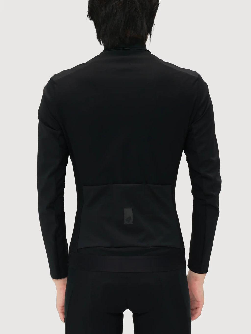 Shield men’s cycling jacket black with long sleeves sleek fit and subtle brand logo on the back