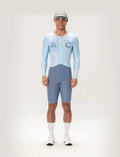 Light blue and gray long sleeve lameda ac men skinsuit featuring ac logo designed for cycling performance