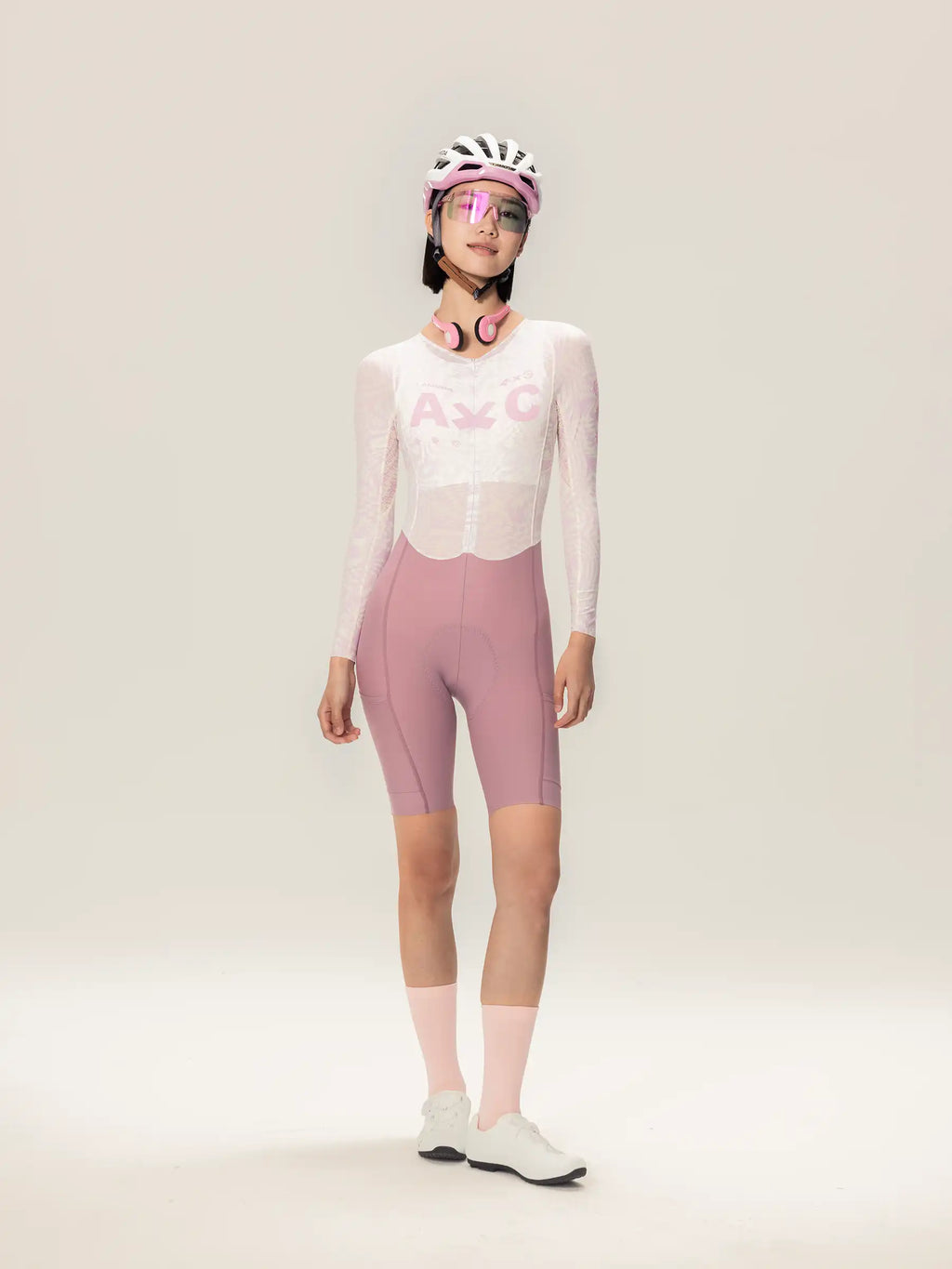 Lameda A*C women cycling skinsuit long sleeves in pink and white with mesh panels and fitted design