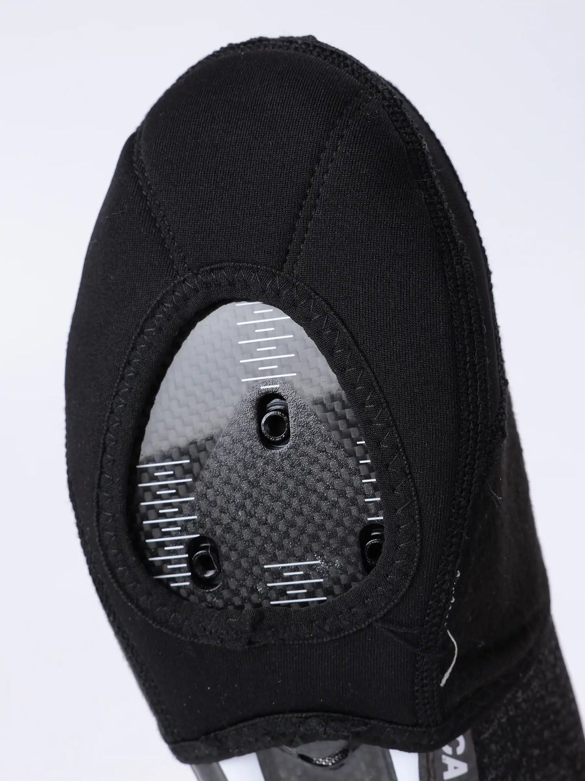 Black fabric cycling shoe toe caps with mesh panel and plastic fasteners for windproof cycling shoe protection