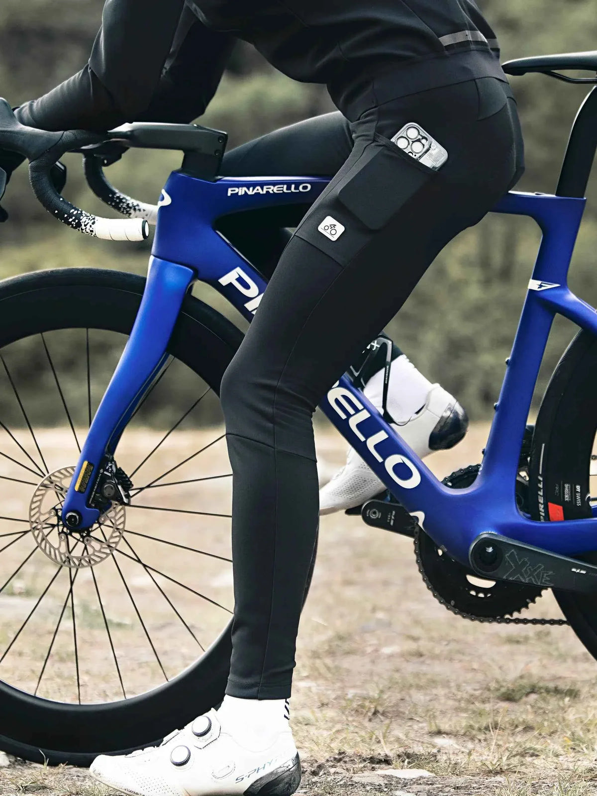 Black Spear men’s thermal fleeced bib tights with reflective logo patches and a sleek, form-fitting design