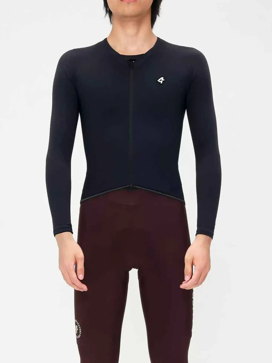 Black lameda polar night fleeced thermal jersey with subtle white logo paired with maroon cycling shorts
