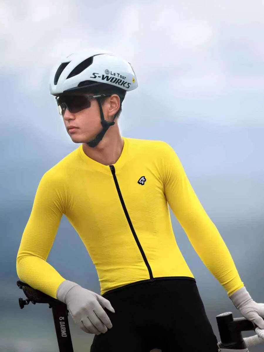 A bright yellow lameda polar night thermal jersey for men with long sleeves black zipper and fleeced material