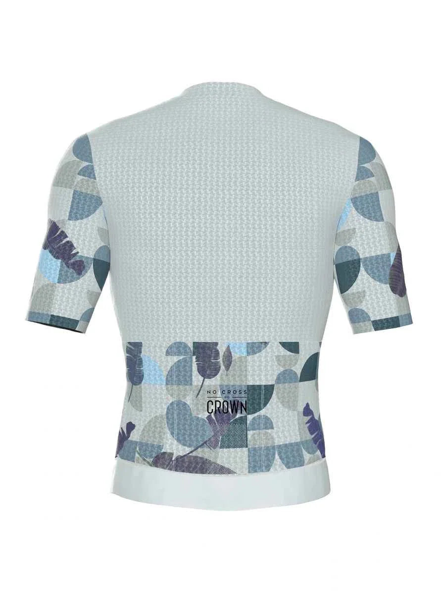 Trending men’s cycling jersey in white with a relaxed fit featuring a geometric leaf pattern in muted blue and gray tones