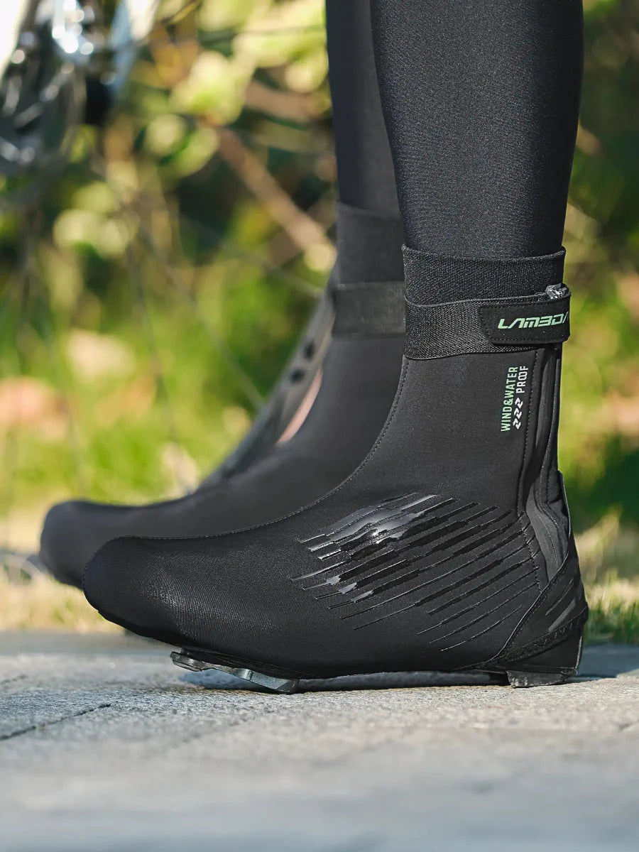 Black lamad warm cycling shoe covers with reinforced toe caps and textured design for light rain and road splashes